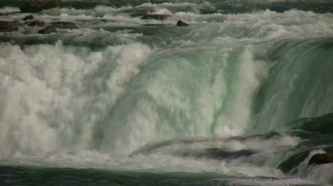 Close-up of water falling over the edge at Niagara Falls Stock Footage 365203