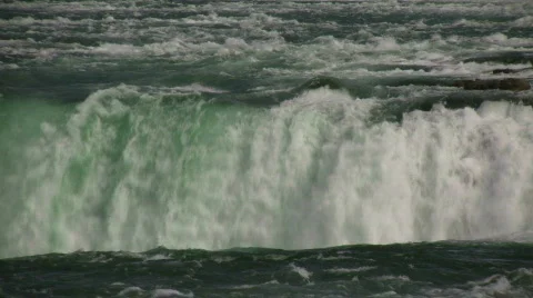 Close-up of water falling over the edge at Niagara Falls Stock Footage 365204