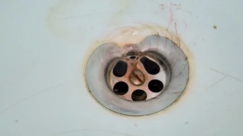 Close-up of water flow in kitchen bath sink Stock Footage 105509476