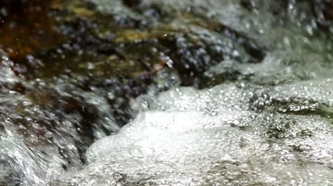 Close up of water flow at the waterfall Stock Footage 49582162