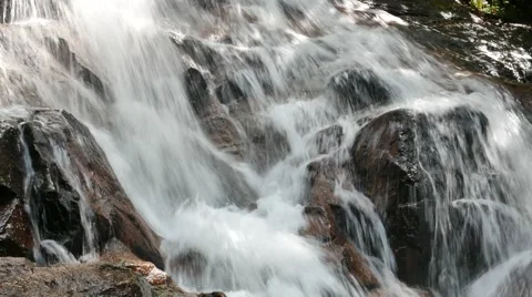 Close-up water flow at waterfall Stock Footage 57313422