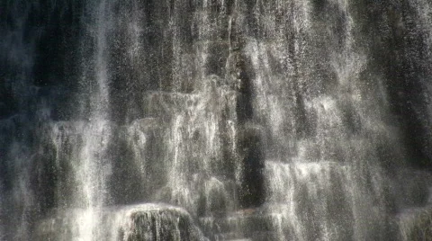 Close-up of water flowing down a rock wall (High Definition) Stock-Footage 365261
