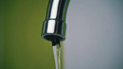 Close-up of Water Flowing From a Kitchen Faucet Stock Footage 252175890