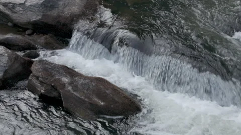 Close up of water flowing in rapids Stock Footage 248559561