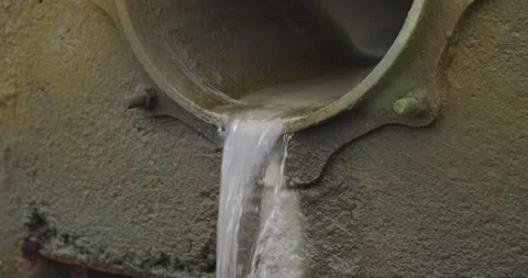Close Up of Water Flowing into the River Thames in London Stock Footage 291098404