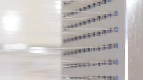 Close-up of water flowing from the shower head. Bathroom. Vertical video Stock Footage 250352676