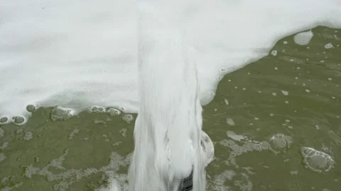 Close-up, the water flows from the nozzle in the city fountain in the summer  스톡 동영상 107280801