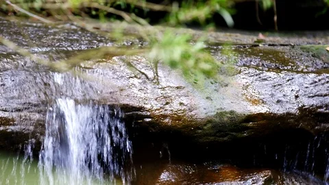 Close Up Water Over Rocks Stock Footage 74643214