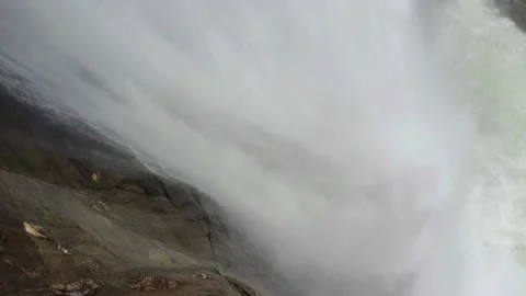 Close up of water plumming down an 80 meter high waterfall Stock Footage 152862192