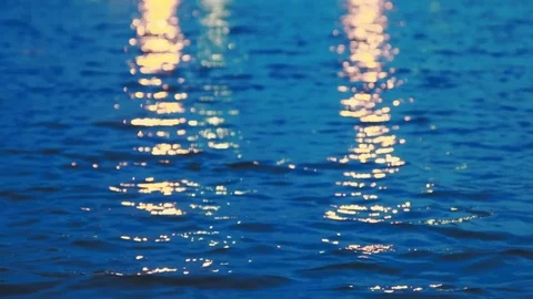 Close up of water pond surface during the night with reflection from city light Stock Footage 107432535