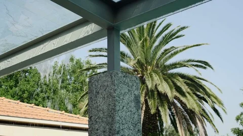 Close up of water pouring down from glass ceiling, Portugal Stock Footage 128965584