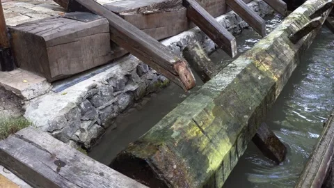 Close-Up water-powered trip hammer Stock Footage 345410782