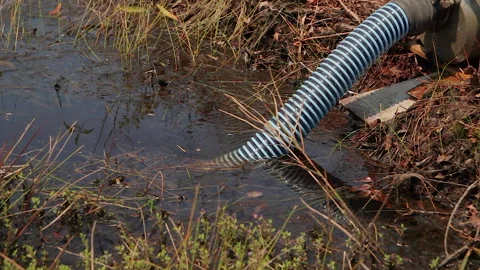 Close of Water Pump at Land Clearing with Fire, Indonesia Stock Footage 142775257