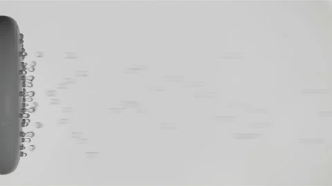 Close-up of water quickly dropping from a shower head on a gray background. Stock Footage 234136816