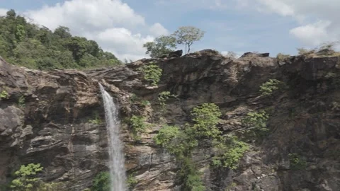 Close-up of water rushing down a steep rock face Stock Footage 302265115