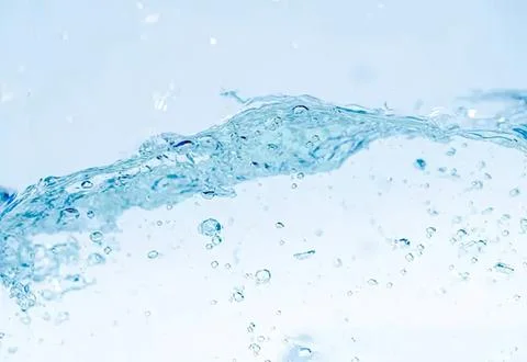 Close-up of water splash with bubbles and waves Foto stock