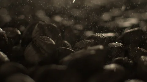 Close up of water sprayed on coffee beans 스톡 동영상 87731632