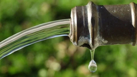 Close-up water stream flowing in slow motion cinemagraph plotagraph Stock Footage 97740886