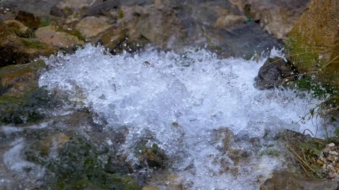 Close up of water stream with white and transparent bubbles. Stock Footage 127570446