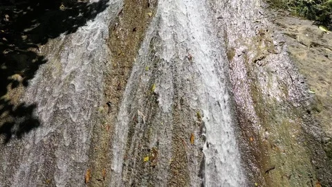 Close up of water streaming down mountainside in Jamaica Stock Footage 125094841