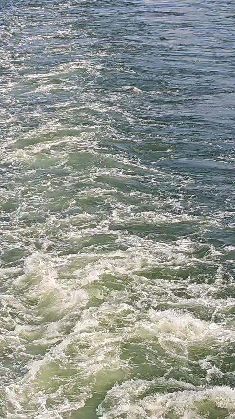 Close-up of water waves and foam, Detailed view of rippling water and foam Stock Footage 310309340