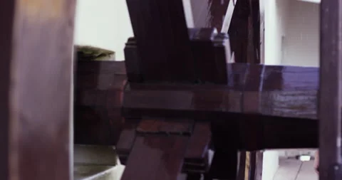 Close up of water wheel spinning while Sergio Cosme watching in slow motion Video stock 156281910