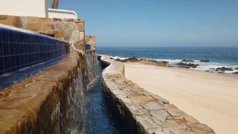 Close up of a waterfall at the beach Stock Footage 113989006