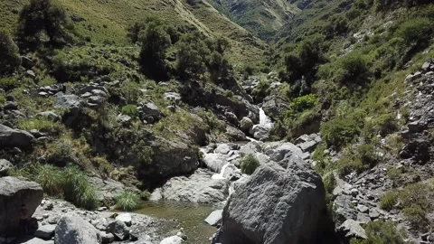 Close Up waterfall between mountains in Merlo Stock Footage 159571541