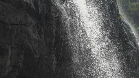 Close up Waterfall cascade on mountain rocks Stock Photos