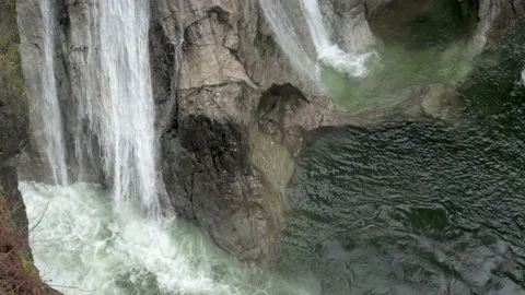 Close up waterfall into clear pool, 4K Stock Footage 168912214