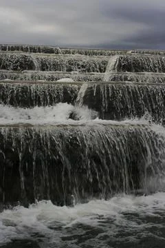 Close-up waterfall in cloudy weather. Stock Photos