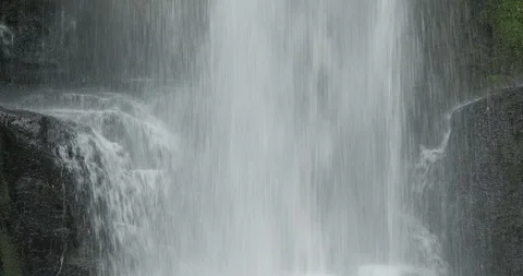 A close up of a waterfall falling over rocks Stock Footage 120432181