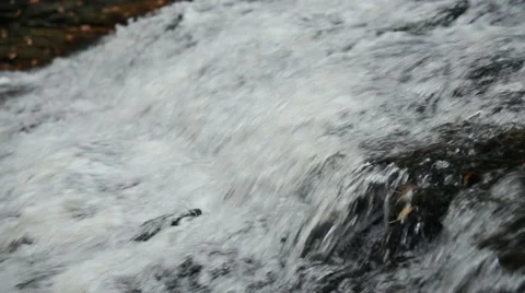 Close up waterfall flowing over rock Stock Footage 44212915
