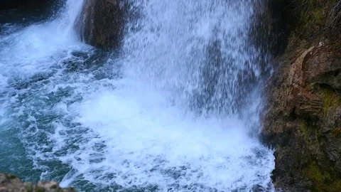 Close-up of a waterfall flowing in slow motion Stock Footage 123110654