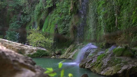 Close-up waterfall over mossy rocks in lush Turkish forest 스톡 동영상 311643078