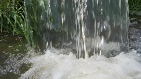 Close-up of a waterfall of water from a pipe Stock Footage 131664986