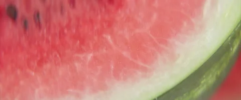 Close-up of watermelon slice 4k anamorphic footage Stock Footage 314372687