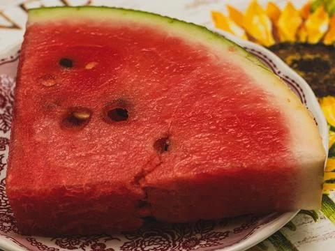 Close-up of watermelon slice on plate Stock Photos