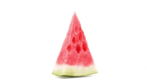 Close-up of watermelon slice rotating on white background. Stock Footage 160146508