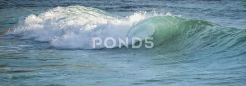 Close-up of a wave breaking at the shore,Wellington, New Zealand Stock Photos
