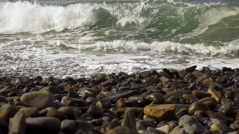 Close-up of a wave falls to the shore slow mo Stock Footage 82906768