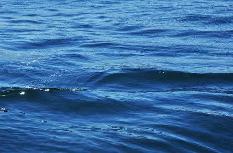 Close-up of a wave from a passing ship Stock Photos
