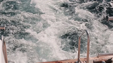 Close up of wave splash from sailing motor yacht. Stock Footage 234418509