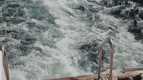 Close up of wave splash from sailing motor yacht. Video stock 234988770