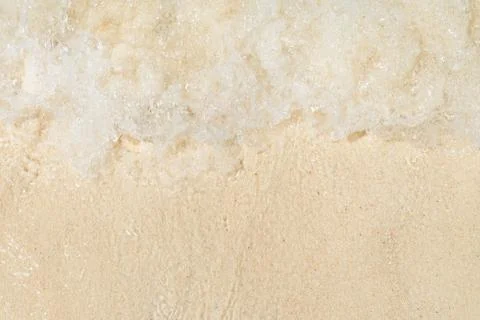 Close up wave top view of wave on sand beach seashore,sea nature background,s Stock Photos