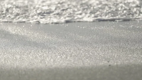 Close-up of wave washing over sand, San Francisco Stock Footage 333194317