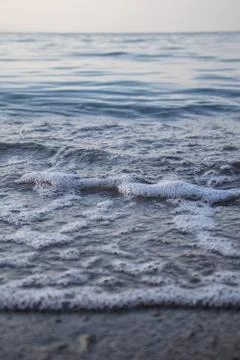 Close-up of waves and bubbles Stock Photos