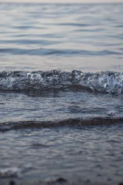 Close-up of waves and bubbles Stock Photos