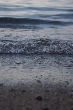 Close-up of waves and bubbles Stock Photos