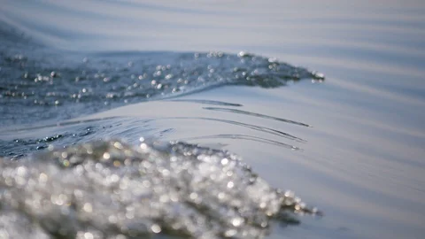 Close-up waves and sponges from sailing Stock Footage 102420118